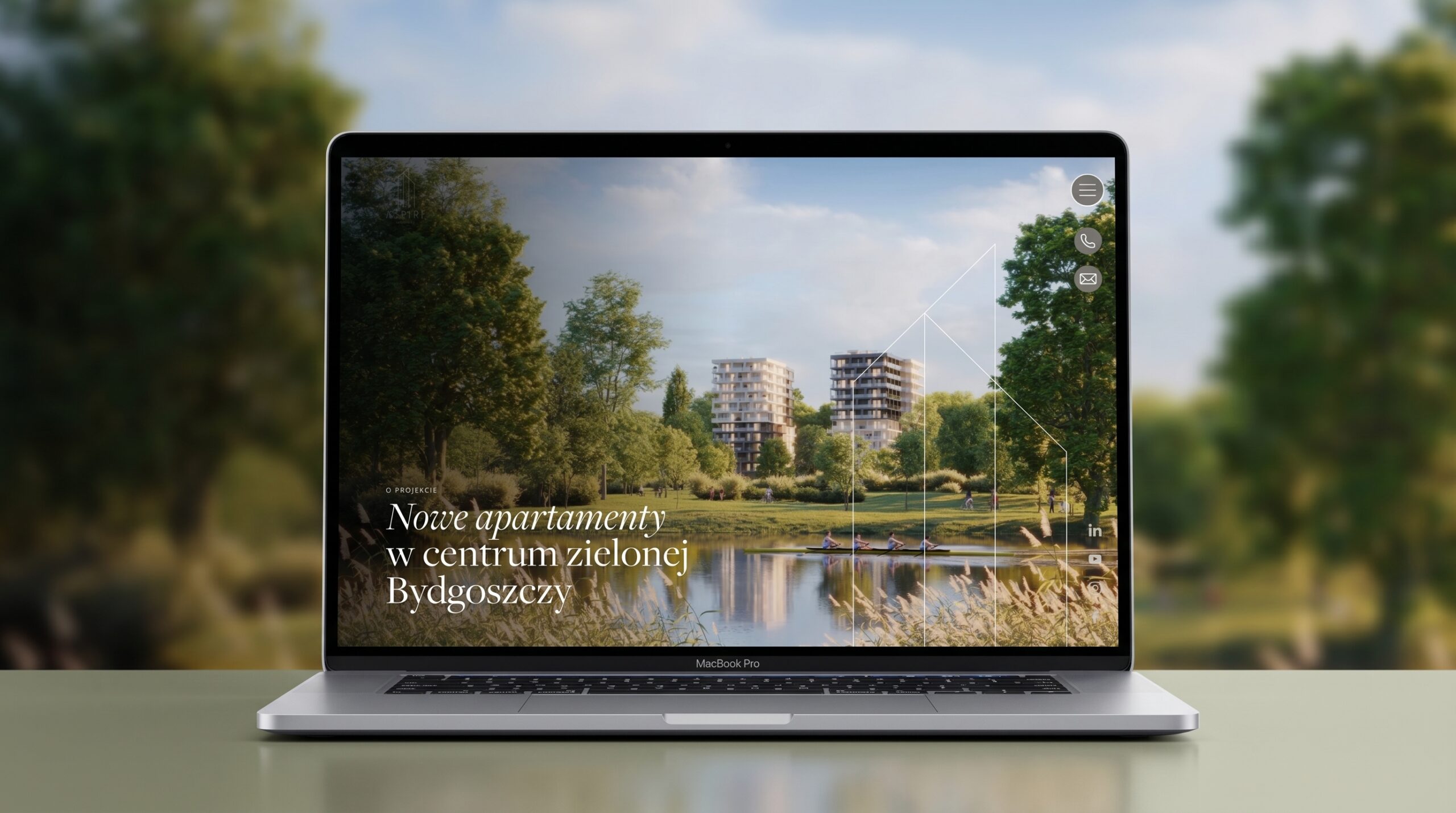 Podstrona O projekcie serwisu inwestycji ASPIRE Bydgoszcz na ekranie MacBooka - osobna strona inwestycji deweloperskiej, Arkada Invest